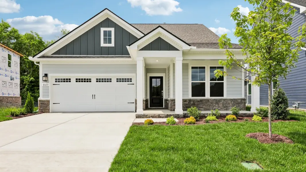 Front exterior with 2-car garage