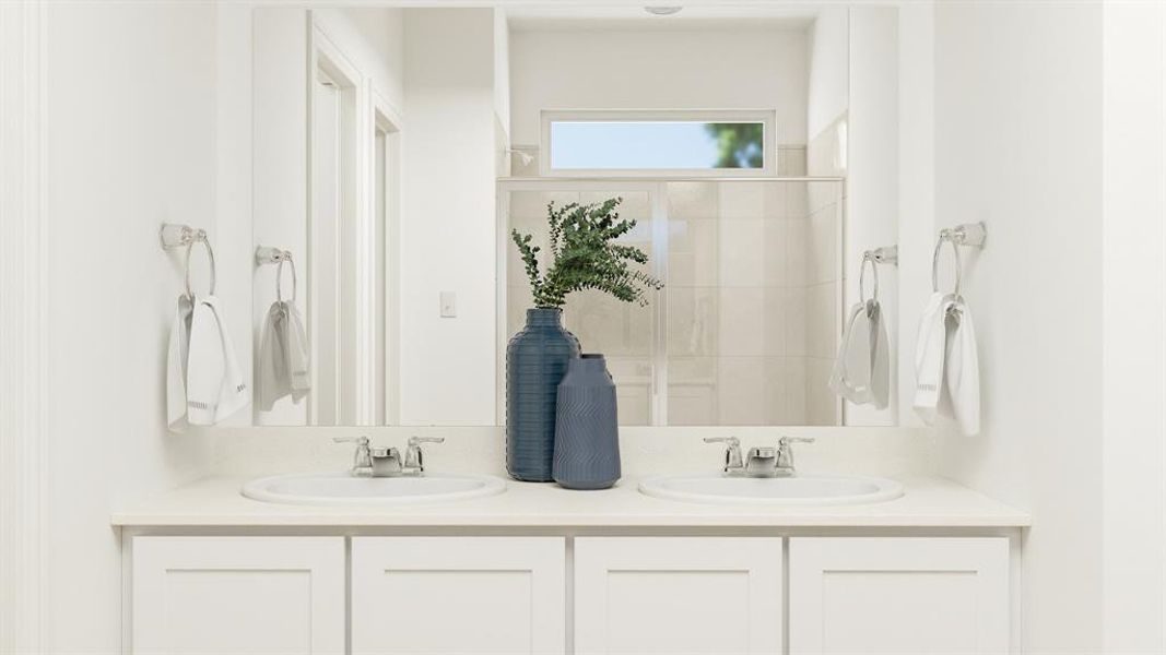 Bathroom featuring double vanity