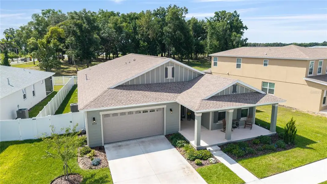 Front exterior of a new home in , Ocala, FL, highlighting curb appeal (Image 2). Front exterior of a new home in , Ocala, FL, highlighting curb appeal (Image 2).