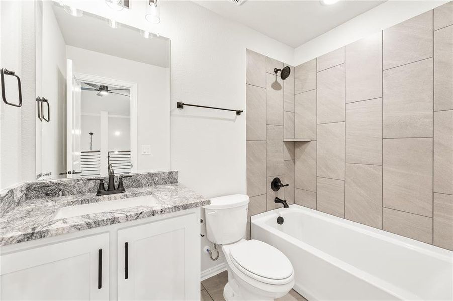 Furnished interior view inside a new home in Creekview Meadows, Pilot Point (Image 13).