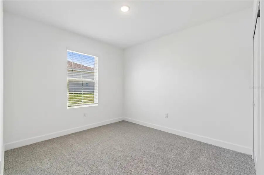 Spacious, unfurnished interior of a new home in Aspire at The Pines, Dunnellon (Image 16).
