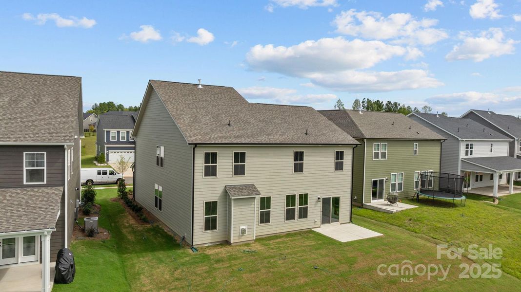 Front exterior of a new home in Lakeside Glen, York, SC, highlighting curb appeal (Image 2). Front exterior of a new home in Lakeside Glen, York, SC, highlighting curb appeal (Image 2).