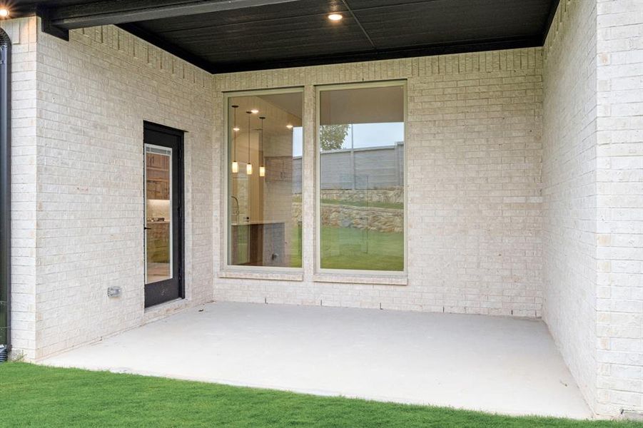 Exterior details and patio area of a home in Painted Tree Woodland District 50, McKinney (Image 3). Exterior details and patio area of a home in Painted Tree Woodland District 50, McKinney (Image 3).