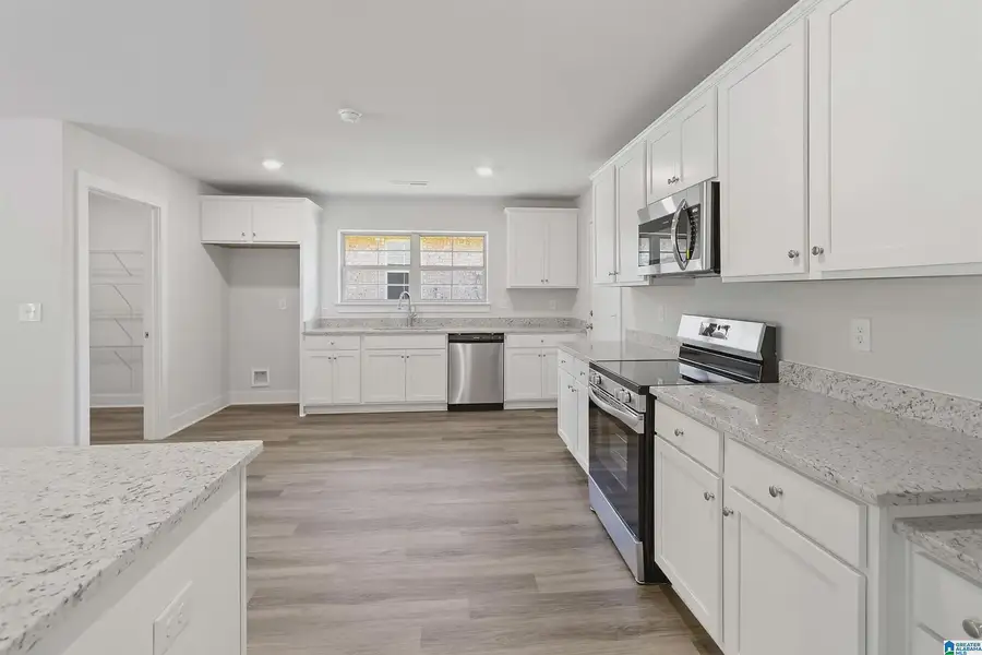 Representative furnished interior of a home built from the 3000 by Adams Homes in Hill Country Estates, Dade City (Image 4).