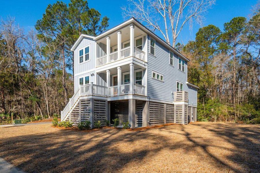 Front exterior of a new home in Kings River Preserve, Hollywood, SC, highlighting curb appeal (Image 1). Front exterior of a new home in Kings River Preserve, Hollywood, SC, highlighting curb appeal (Image 1).