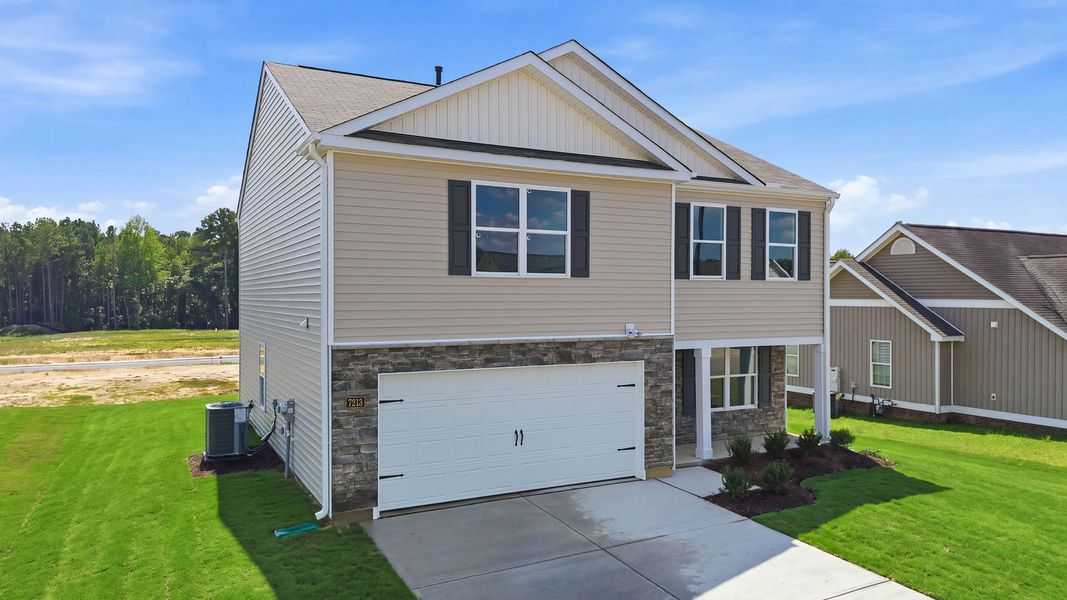 Front exterior of a new home in Hunter Hill, Rocky Mount, NC, highlighting curb appeal (Image 12).