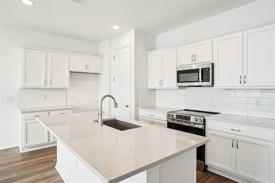 Furnished interior view inside a new home in Isla Mirada, San Antonio (Image 13).