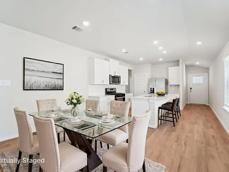 Furnished interior view inside a new home in Granger Pointe - Traditional Series, Conroe (Image 3).