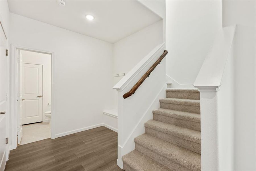 Furnished interior view inside a new home in East Oak Creek Elements, Commerce (Image 22).