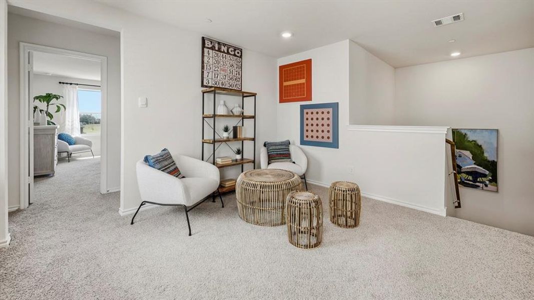 Living area featuring carpet floors and recessed lighting Living area featuring carpet floors and recessed lighting