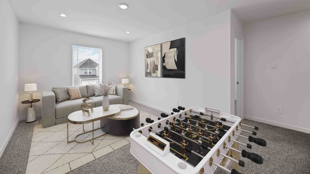 Representative furnished interior of a home built from the Magnolia by D.R. Horton in Grand West, Houston (Image 8).