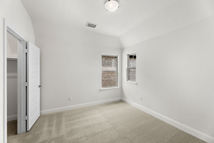Representative unfurnished interior of a home built from the Willow by UnionMain Homes in Edgewater, Fate (Image 23).