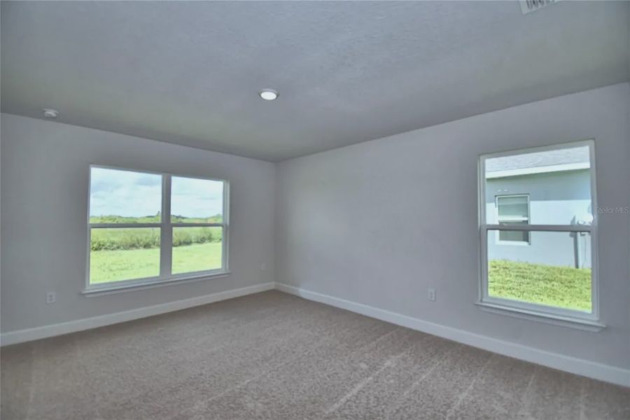 Spacious, unfurnished interior of a new home in Cadence Crossing, Auburndale (Image 29).