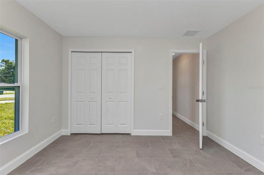 Spacious, unfurnished interior of a new home in , North Port (Image 34).