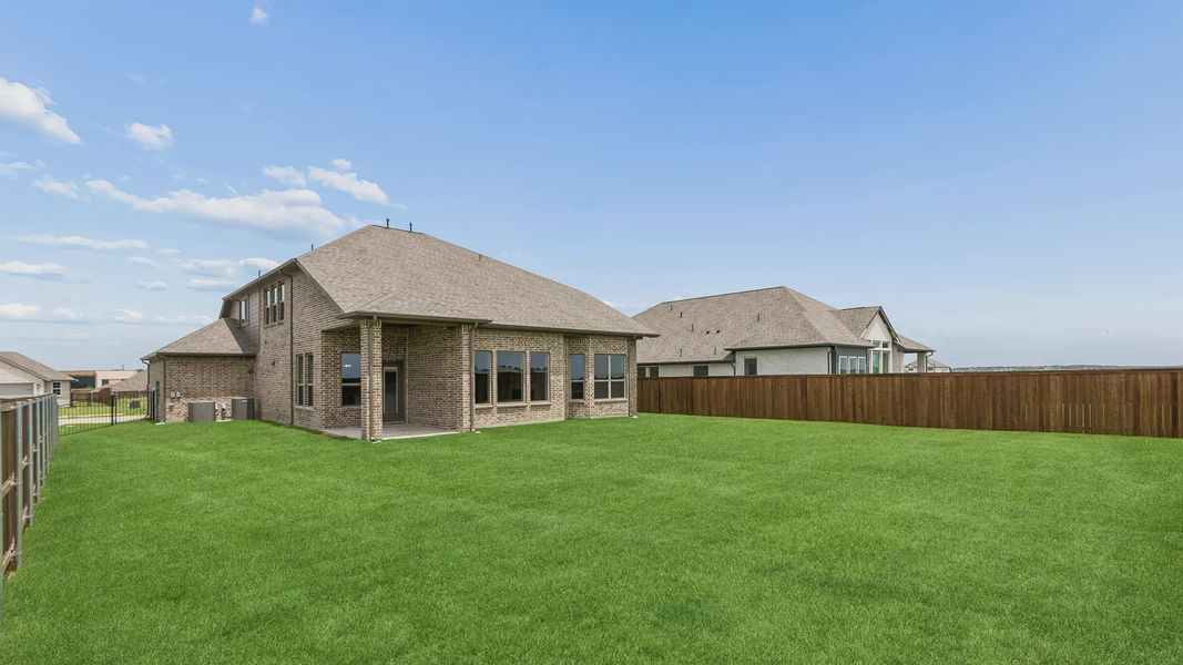 Exterior details and patio area of a home in Silo Mills, Joshua (Image 3).