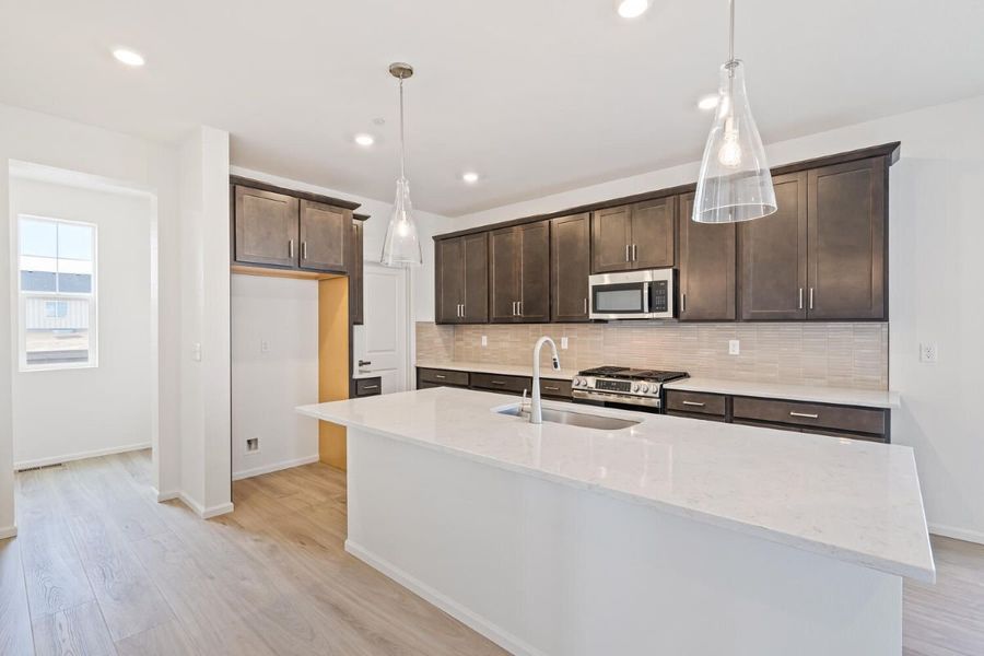 Furnished interior view inside a new home in The Nest Reserve at Canyon Creek, Erie (Image 7).