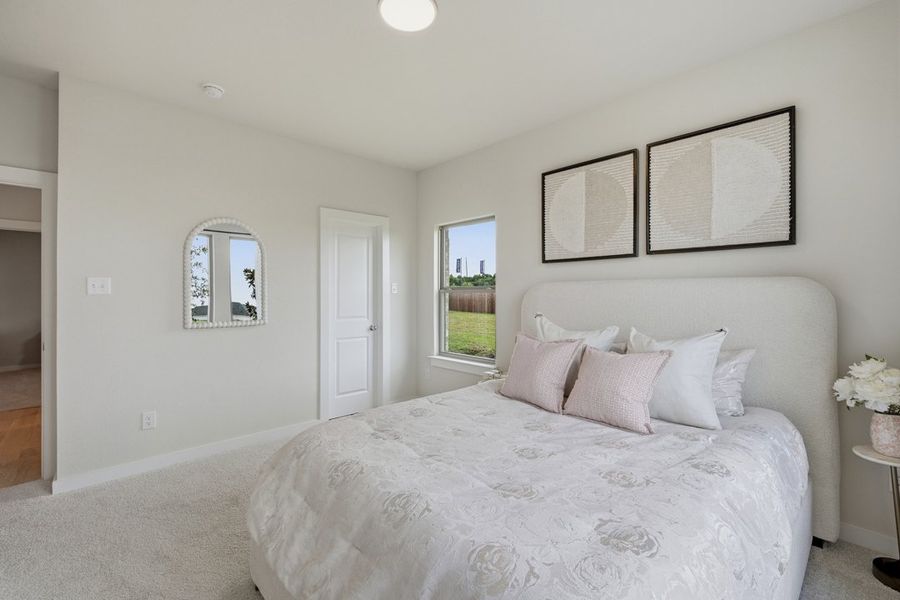 Representative furnished interior of a home built from the The Albany by Lillian Custom Homes in Tabor Ranch, Ponder (Image 30).