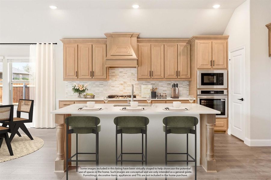 Kitchen with light wood cabinets, center island with three bar stools, tile backsplash, and built-in stainless steel appliances Kitchen with light wood cabinets, center island with three bar stools, tile backsplash, and built-in stainless steel appliances