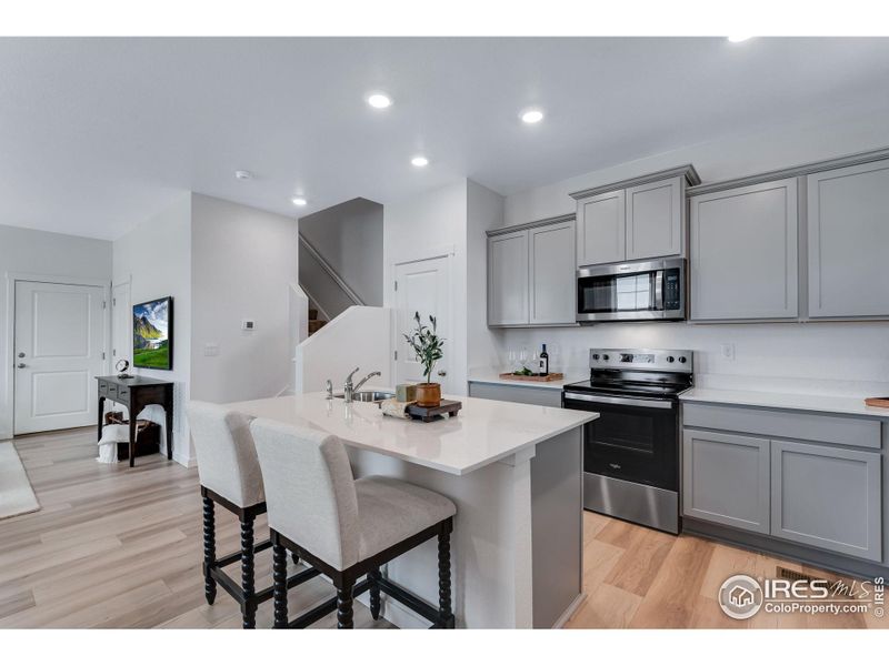 Furnished interior view inside a new home in Vista Meadows, Fort Lupton (Image 30).