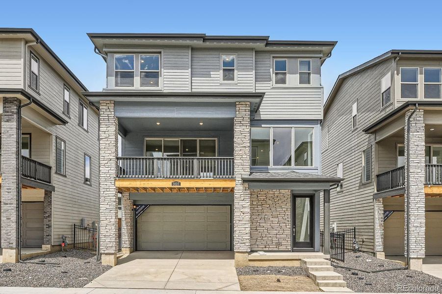 Front exterior of a new home in Red Rocks Ranch: The Skyline Collection, Morrison, CO, highlighting curb appeal (Image 2).