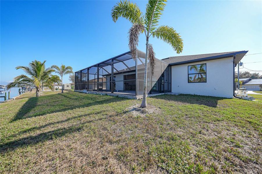 Exterior details and patio area of a home in , Port Charlotte (Image 25).