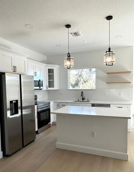 Furnished interior view inside a new home in , North Port (Image 4).