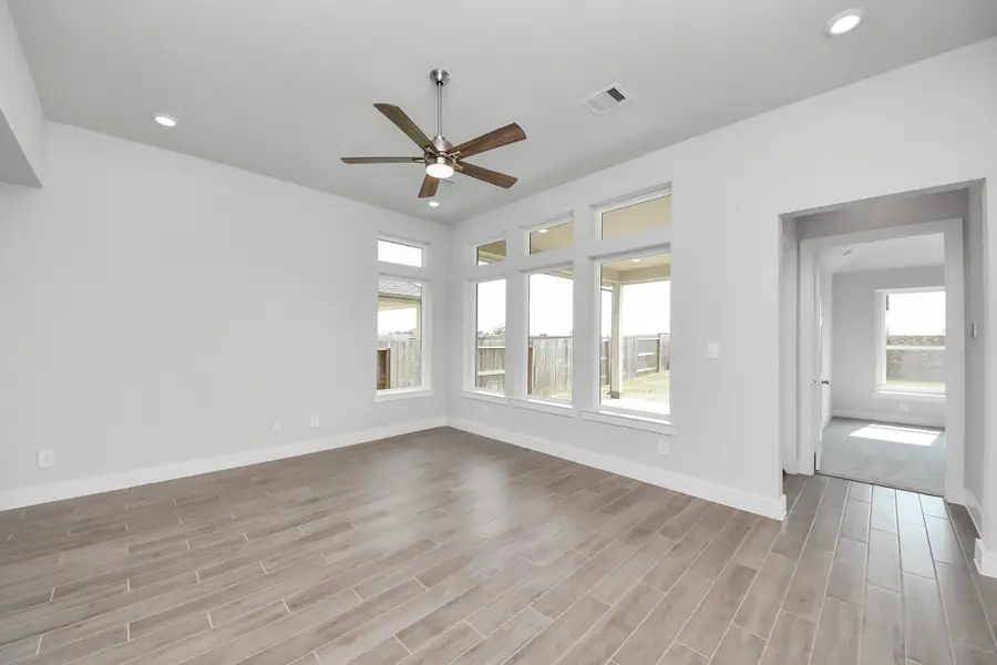 Spacious, unfurnished interior of a new home in Amira: Premier Collection, Tomball (Image 17).