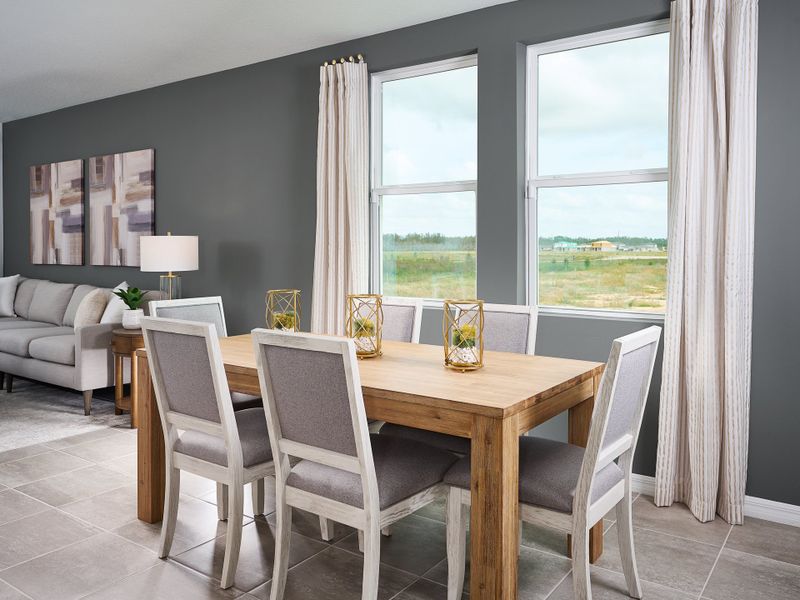 Dining room in the Yellowstone floorplan modeled at Springs at Lake Alfred