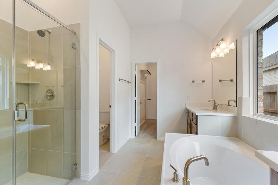 Furnished interior view inside a new home in Sunterra, Katy (Image 9).