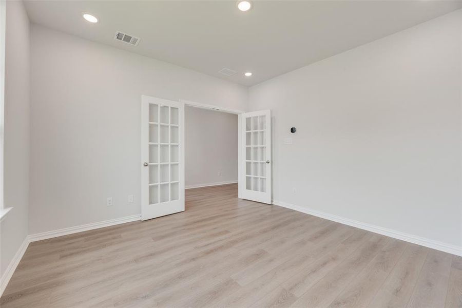Spacious, unfurnished interior of a new home in Valencia On The Lake, Little Elm (Image 26). Spacious, unfurnished interior of a new home in Valencia On The Lake, Little Elm (Image 26).