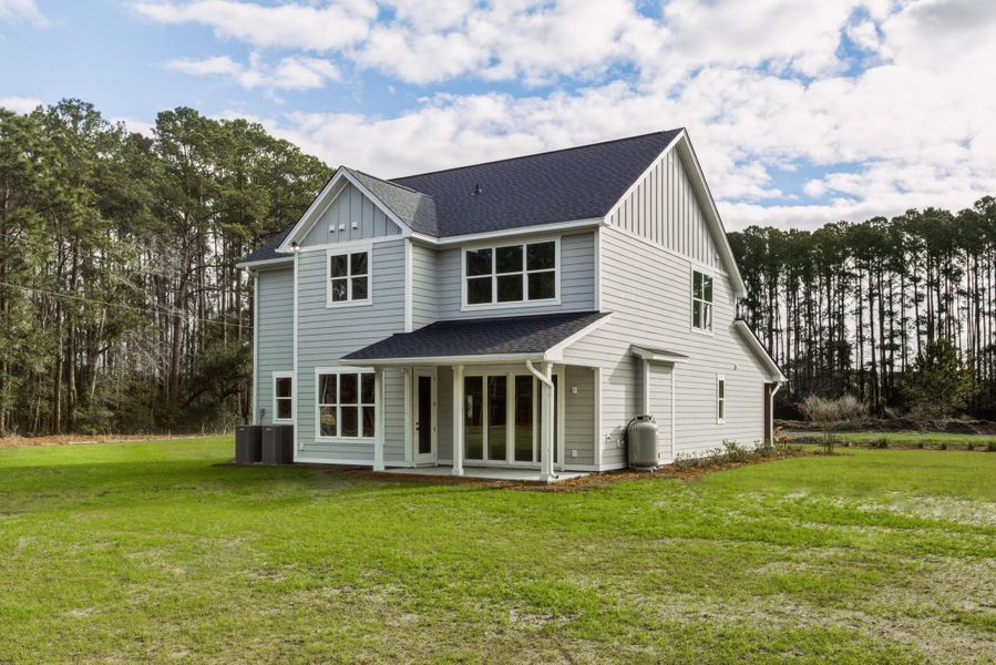 Exterior details and patio area of a home in , Johns Island (Image 35).