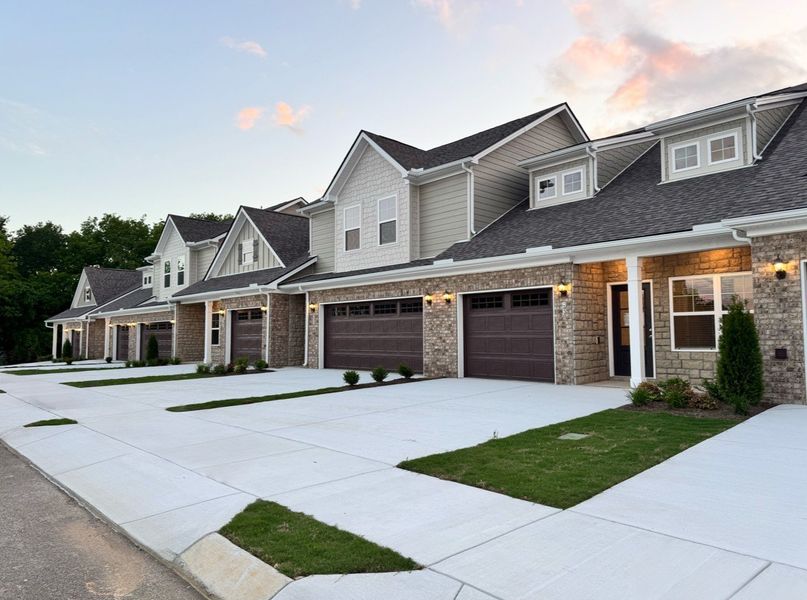 Front exterior of a new home in Park Place, Shelbyville, TN, highlighting curb appeal (Image 21).