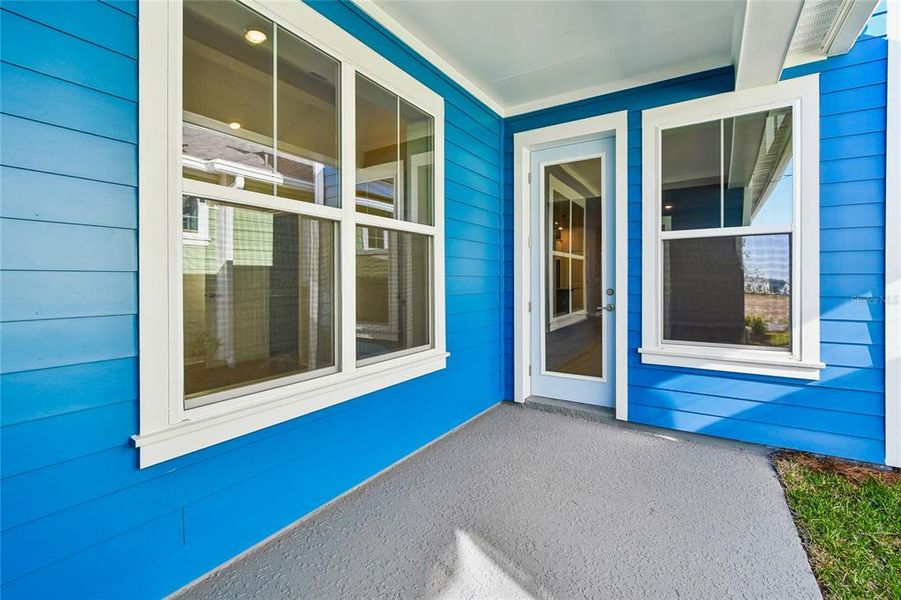Exterior details and patio area of a home in Laureate Park at Lake Nona - Garden Series, Orlando (Image 4).