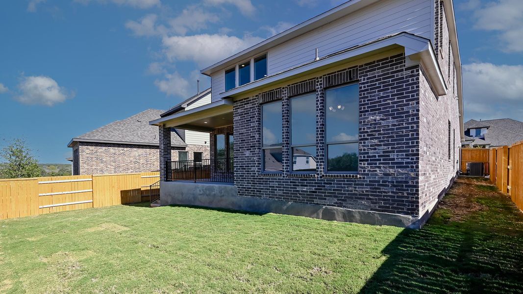 Exterior details and patio area of a home in 6 Creeks 50', Kyle (Image 18).