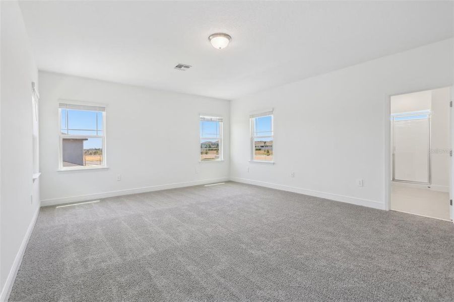 Spacious, unfurnished interior of a new home in Cyrene at Minneola - Villas, Montverde (Image 24).