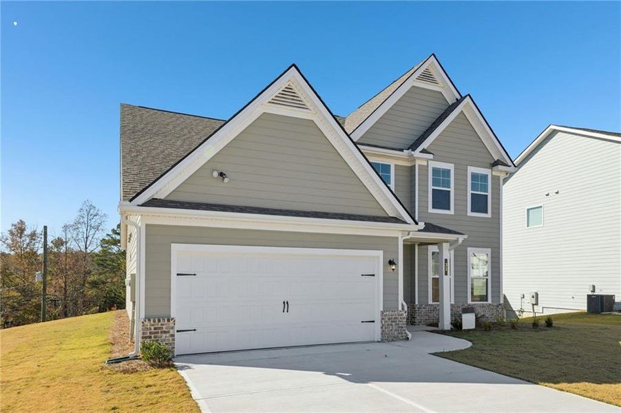 Front exterior of a new home in Chapel Hill, Newnan, GA, highlighting curb appeal (Image 25). Front exterior of a new home in Chapel Hill, Newnan, GA, highlighting curb appeal (Image 25).