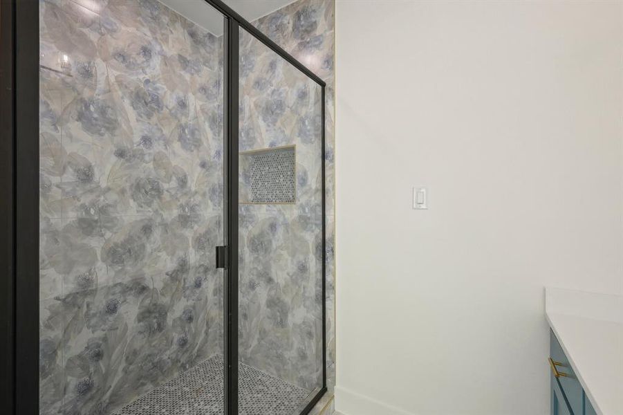 Full bathroom with vanity and a shower stall Full bathroom with vanity and a shower stall