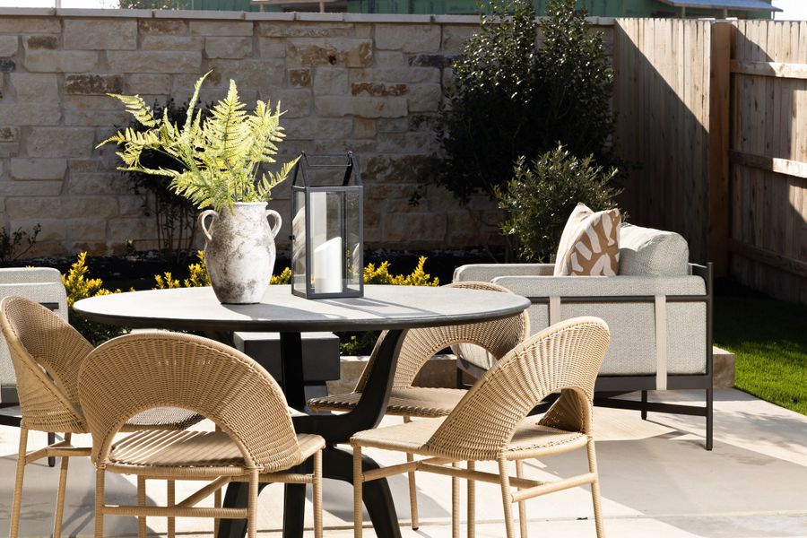 Exterior details and patio area of a home in Heritage, Dripping Springs (Image 3).