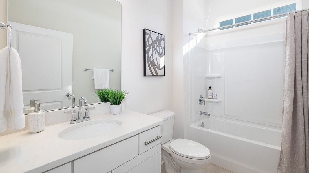 Furnished interior in a model home at Reserve at Tap Root Farms in Fletcher (Image 51).