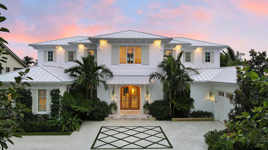 Front exterior of a new home in , North Palm Beach, FL, highlighting curb appeal (Image 20). Front exterior of a new home in , North Palm Beach, FL, highlighting curb appeal (Image 20).