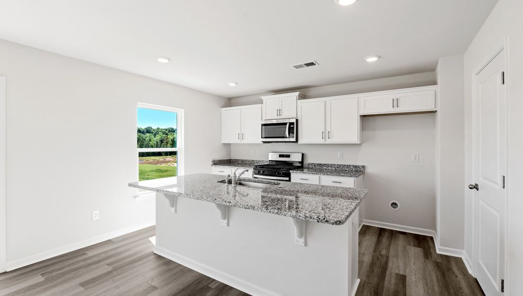 Furnished interior view inside a new home in Wildbrook Village, Waynesville (Image 6). Furnished interior view inside a new home in Wildbrook Village, Waynesville (Image 6).