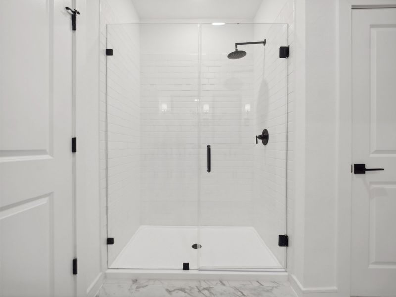 Primary bath with glass shower enclosure Primary bath with glass shower enclosure