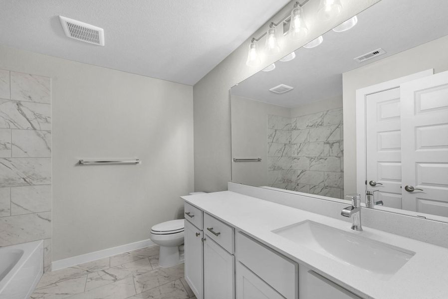 Furnished interior view inside a new home in Briarwood Crossing, Rosenberg (Image 12).