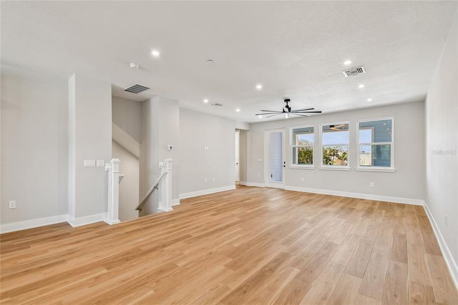 Spacious, unfurnished interior of a new home in EvenTide, New Smyrna Beach (Image 18).