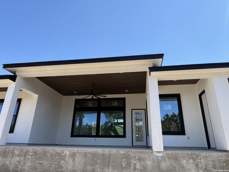 Exterior details and patio area of a home in , Spring Branch (Image 10).