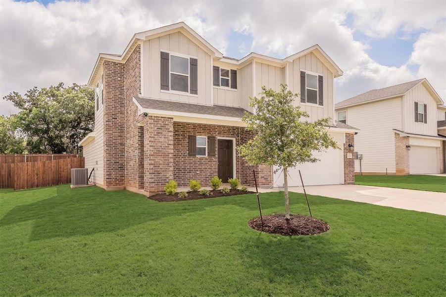 Front exterior of a new home in Courtland Place, Cleburne, TX, highlighting curb appeal (Image 2). Front exterior of a new home in Courtland Place, Cleburne, TX, highlighting curb appeal (Image 2).
