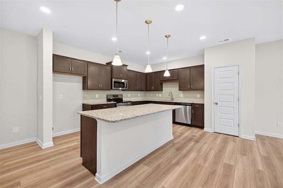 Furnished interior view inside a new home in Jameson Towns, Villa Rica (Image 8).