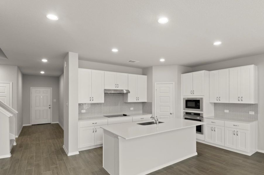 Furnished interior view inside a new home in Oaks at San Gabriel, Georgetown (Image 10).