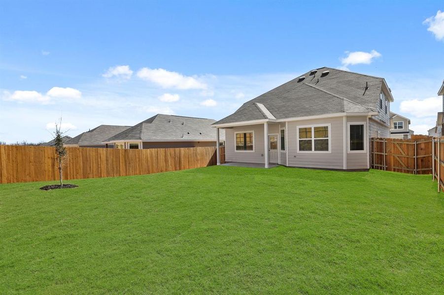 Front exterior of a new home in Retreat at Fossil Creek, Fort Worth, TX, highlighting curb appeal (Image 2). Front exterior of a new home in Retreat at Fossil Creek, Fort Worth, TX, highlighting curb appeal (Image 2).