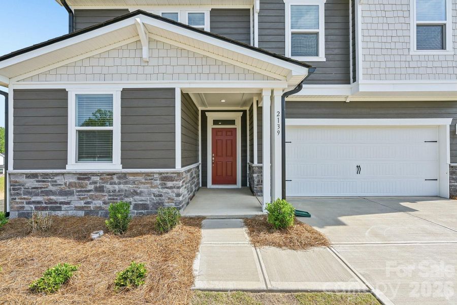 Exterior details and patio area of a home in Bella Vista Heritage, Denver (Image 3).